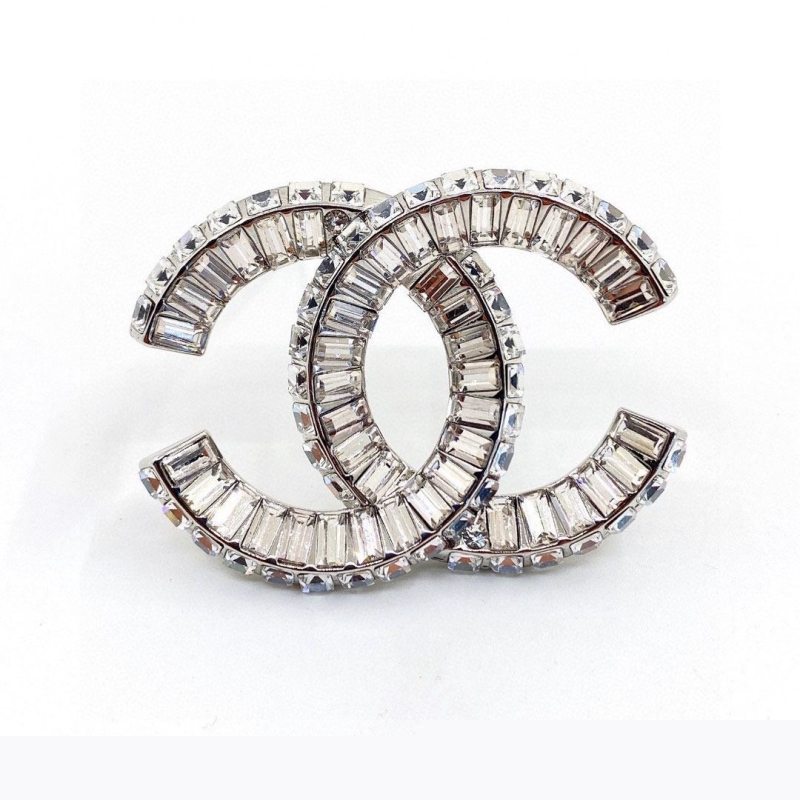 Ch*el brooches
